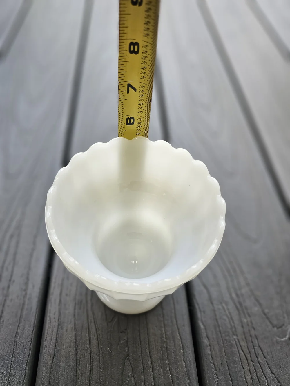 Vintage E.O. Brody white milk glass footed urn planter featuring a fluted body